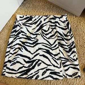 super cute zebra print short skirt with small slit on the side perfect for clubs